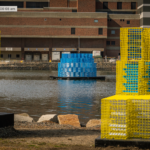 "FutureSHORELINE," an art installation by Carolina Aragón along Fort Point Channel, imagines how high the water will rise in coming decades. (Courtesy Matt Conti)