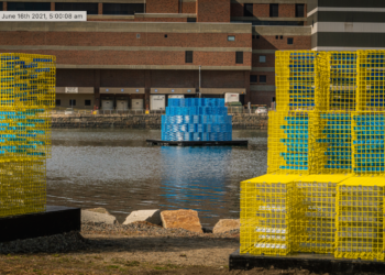 "FutureSHORELINE," an art installation by Carolina Aragón along Fort Point Channel, imagines how high the water will rise in coming decades. (Courtesy Matt Conti)